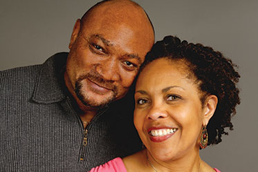 Photo of a couple smiling. Link to Life Stage Gift Planner Under Age 60 Situations.